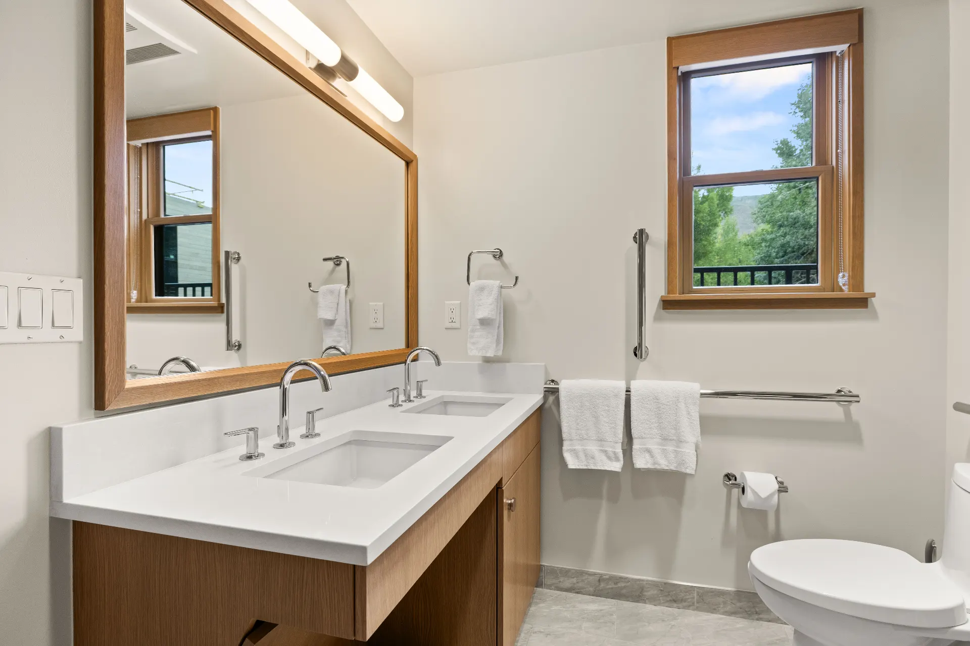 Double vanity bathroom with natural light